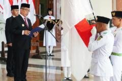 Bupati Madiun, Hari Wuryanto mengukuhkan Paskibraka Upacara HUT ke-81 Republik Indonesia Kabupaten Madiun 2026./dok.DNY
