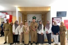 foto bersama jajaran Bidang Litbang Bappeda Kota Malang dan tim akademisi UB.