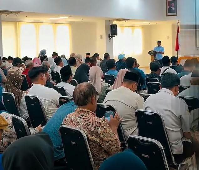 Plt Kepala Dinas Lingkungan Hidup Kota Malang Gamaliel Raymond Hatigoran Matondang saat memberikan sambutan dalam acara Sosialisasi Kampung Mbois 2026
